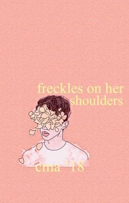 freckles on her shoulders 