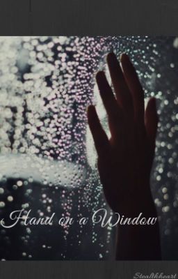 Hand on a Window